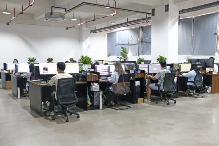 Rakumart team working in the office